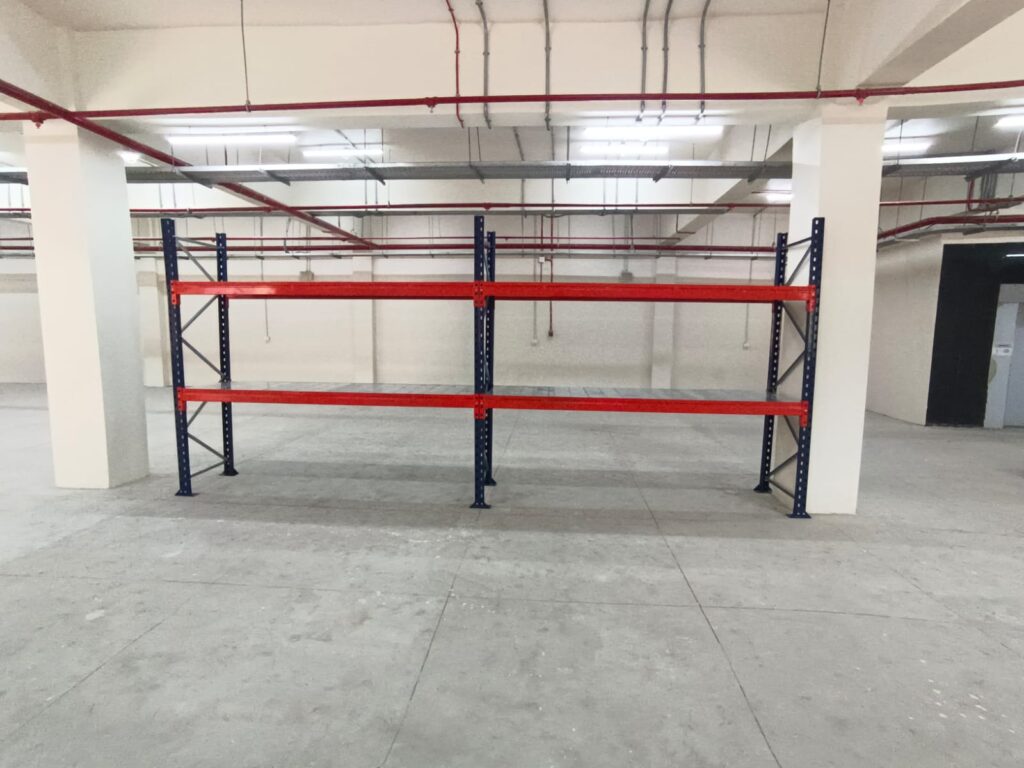 Heavy duty storage racks with adjustable CRCA steel shelves for industrial warehouse storage — manufactured by Myriad Storage System LLP
